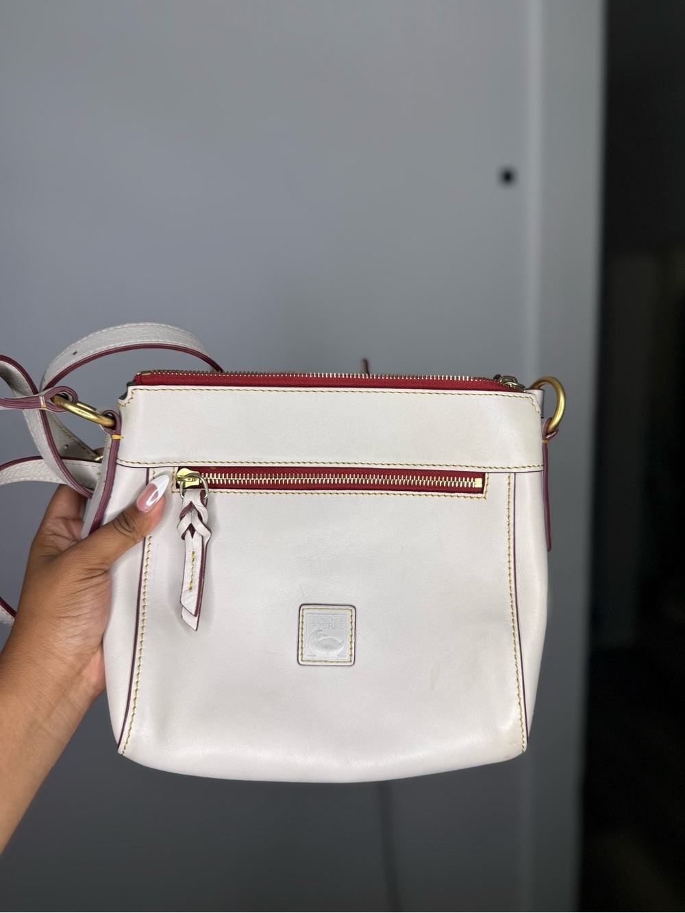 Dooney & Bourke Cream Crossbody with Red Trim and Gold Hardware
